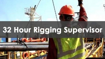 Participants learning rigging safety in a classroom setting